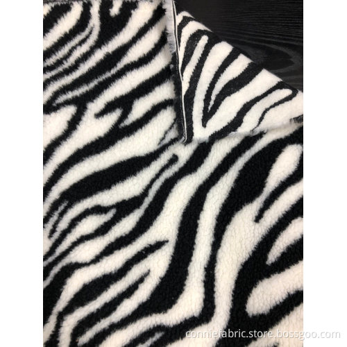 100% Polyester Sherpa Jacquard Stickad med Zebra Stripe